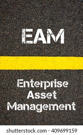 Concept Image Of Business Acronym EAM Enterprise Asset Management Written Over Road Marking Yellow Paint Line