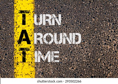 Concept Image Of Business Acronym TAT As Turn Around Time Written Over Road Marking Yellow Painted Line.