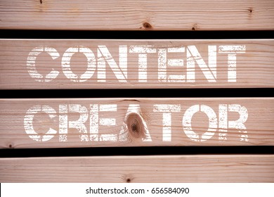 Concept image Content Creator over wooden background