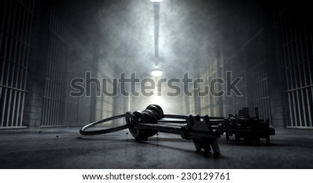 A concept image of an eerie corridor in a prison at night showing jail cells dimly illuminated by various ominous lights and a bunch of cell keys laying ominously on the floor
