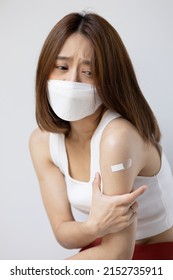 Concept Image Of Fully Vaccinated Asian Woman Wearing Face Mask With Side Effect From Vaccine Shot Or Long Covid