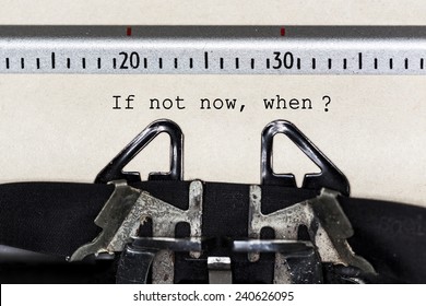 Concept image with "If Not Now, When?" printed on an old typewriter