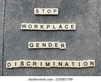 A Concept Image With Letters Spelling Stop Workplace Gender Discrimination