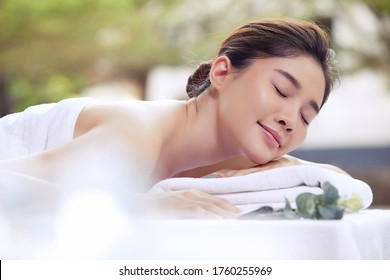 Concept Image Of Luxury Spa Massage  At Travel Destination South East Asia. Young And Beautiful Asian Woman Model.