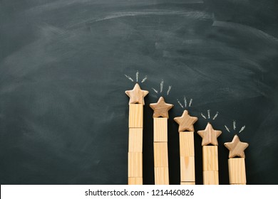 concept image of setting a five star goal. increase rating or ranking, evaluation and classification idea. Top view. Flat lay