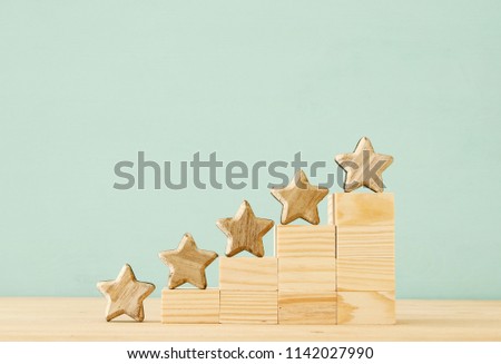concept image of setting a five star goal. increase rating or ranking, evaluation and classification idea