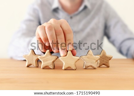 concept image of setting a five star goal. increase rating or ranking, evaluation and classification idea