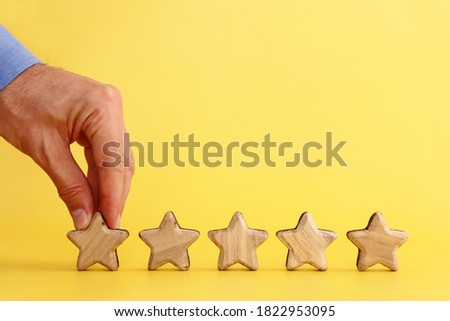 concept image of setting a five star goal. increase rating or ranking, evaluation and classification idea
