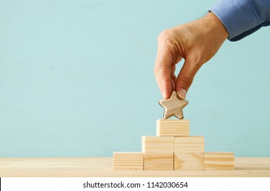 concept image of setting a one star goal. increase rating or ranking, evaluation and classification idea - Shutterstock ID 1142030654