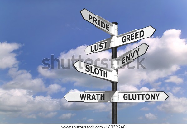 Concept image of a signpost with the seven deadly\
sins upon the arrows.