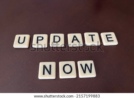 A concept image of tiles spelling update now