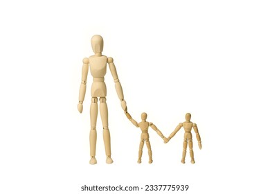 Concept image of a wooden mannequin adult with two children holding hands isolated on a white background with copy space - Powered by Shutterstock