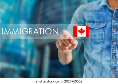 Concept of immigration to Canada with virtual button pressing - Shutterstock ID 2027963552