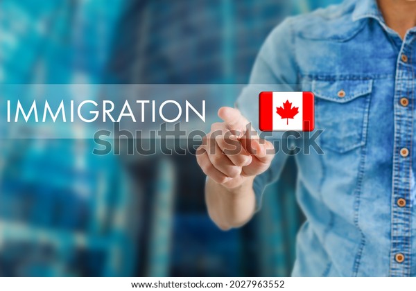 Concept of immigration to Canada with virtual\
button pressing