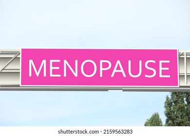 Concept of impending climacteric. Pink sign with word MENOPAUSE outdoors - Shutterstock ID 2159563283