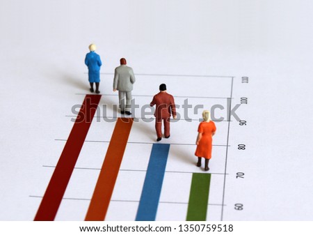 The concept of an increasing elderly population. Miniature old people walking on the bar graph. 