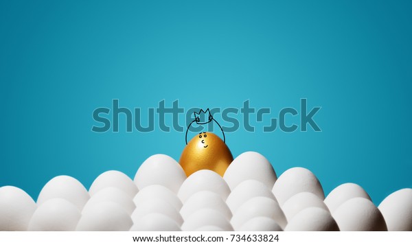 Concept of individuality,\
exclusivity, better choice, winning and ambition. A smiling golden\
egg with funny drawn face and with a crown among white eggs on blue\
background.