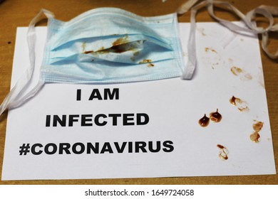 Concept Of I Am Infected Coronavirus On White Paper With Face Mask. New Type Coronavirus 2019-nCoV Has Been Spreading Into Many Cities In China. Deadly Virus Health Risk And Coronavirus Public Disease