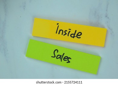 Concept Of Inside Sales Write On Sticky Notes Isolated On Wooden Table.