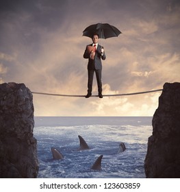Concept of insurance with businessman on the rope