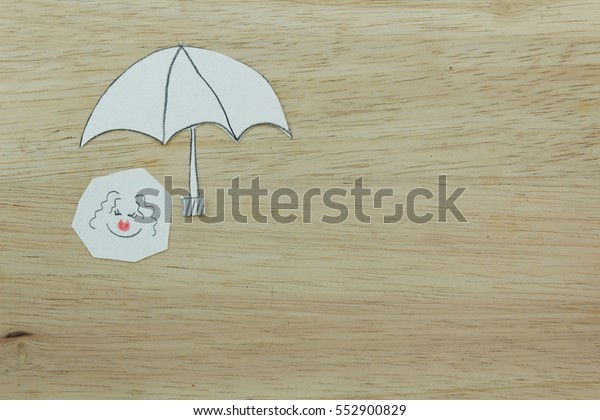 Concept of insurance and protection with\
umbrella over  a woman.\
Conceptual.