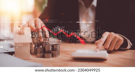 concept of interest rates and dividends ,Interest rate decline graph ,Financial interest rates ,economic recession ,stock market ,finance and investment ,percentage increase in debt ,interest burden


