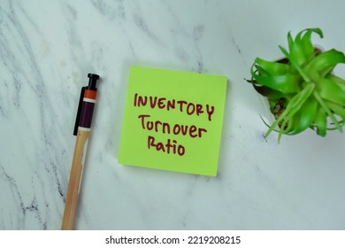 Concept Of Inventory Turnover Ratio Write On Sticky Notes Isolated On Wooden Table.