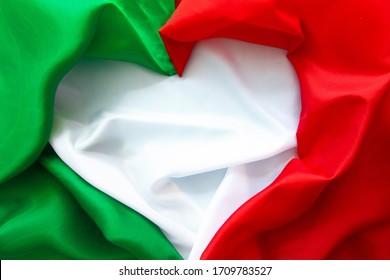 The concept of Italy patriotism - April 25 Liberation Day Text in italian card, italy flag and poppy flowers national public holiday