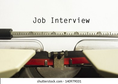 concept of job interview, with message on typewriter.