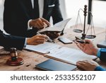 concept of justice and law Judge in courtroom on wooden table and consultant or lawyer working in office. Law advice and justice concept.