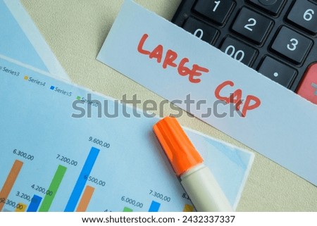 Concept of Large Cap write on sticky notes isolated on Wooden Table.