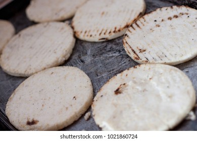 Concept: Latin American Family Cooking And Eating Together. Traditional Colombian Plain And White Arepas. Breakfast Or Dinner With Homemade Typical Arepas. Tradition Food.