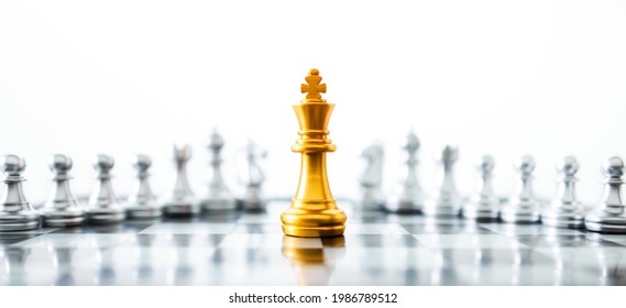 Concept of leadership. Golden king chess on the board on white background. Abstract images show business leadership with copy space. - Powered by Shutterstock