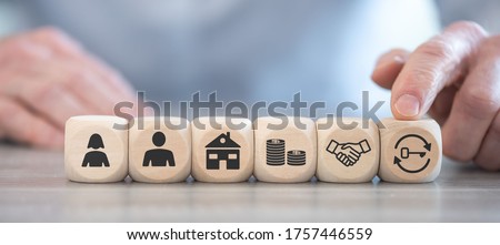 Concept of legacy with icons on wooden cubes