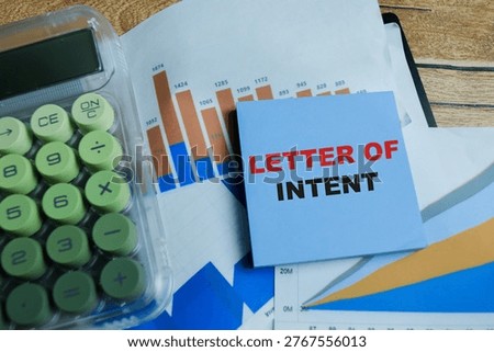 Concept of letter of intent write on sticky notes isolated on Wooden Table.