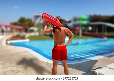 Concept of a lifeguard on watch out in an aqua park - Powered by Shutterstock