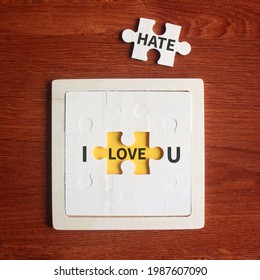 Concept Of Love Hate Relationship. I LOVE HATE U Words Written On Pieces Of Jigsaw Puzzle.