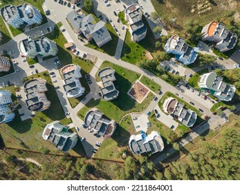 The Concept Of Luxury Living. The Concept Of Travel. Top View Of A Colorful Elite Village. Colorful Houses On The Seashore. Bright Morning View. Aerial Photography. Bird's-eye View.