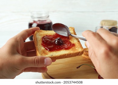 Concept Of Making Cherry Jam Sandwich, Close Up