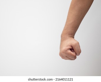 Concept of a man's hand clenched in anger - Shutterstock ID 2164011121