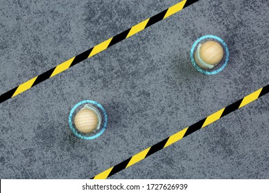 Concept Of Marking On The Ground And Signage, For Physical Or Social Distance In The Street Or In The Workplace To Fight Against The Transmission Of The Covid-19 Virus