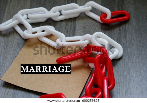 Concept\
of marriage issue with word MARRIAGE and\
chain.