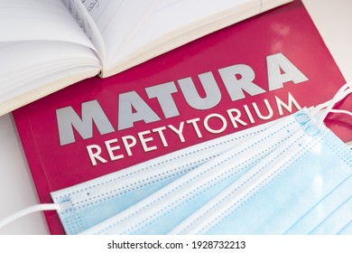 Concept Of Matura Exam During The Pandemic. Closeup Of The Word “matura” And Protective Face Masks.