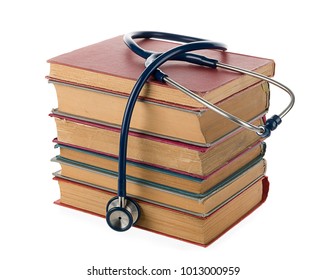 Concept Of Medical Education With Old Books And Stethoscope.   