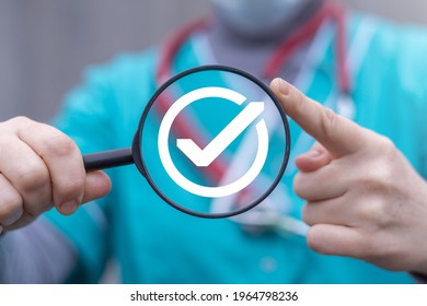 Concept Of Medicine And Pharmacy Standards Compliance. Medical Quality Control. Doctor Hold Magnifying Glass With Check Mark.