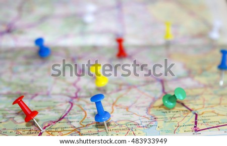 Concept meetings with voters, campaigning. Travel points on the map are marked with colored buttons and shallow depth of field with space for copy.