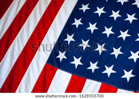 Concept of Memorial or Independence Day or 4th of July. Close Up of Waving National USA American Flag as a Background for elections and primaries. 