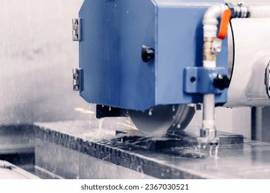 Concept metalworking industry, finish metal working on horizontal surface grinder machine with water and oil. - Powered by Shutterstock