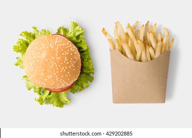 Concept of mock up burger and french fries on white background. Copy space for text and logo. Clipping Path included on white background. - Powered by Shutterstock