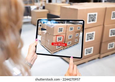 Concept of modern supply chain management. Woman scanning QR codes on boxes in warehouse. - Powered by Shutterstock - Get 15% off with code: PIKWIZARD15
